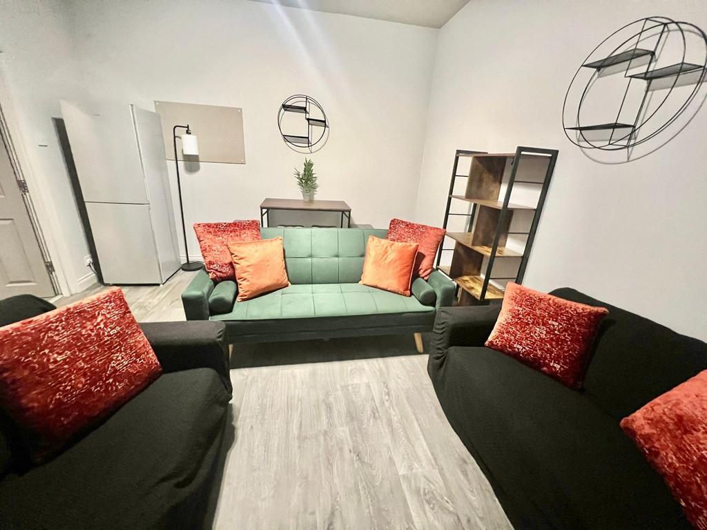 A modern and inviting living room featuring com...