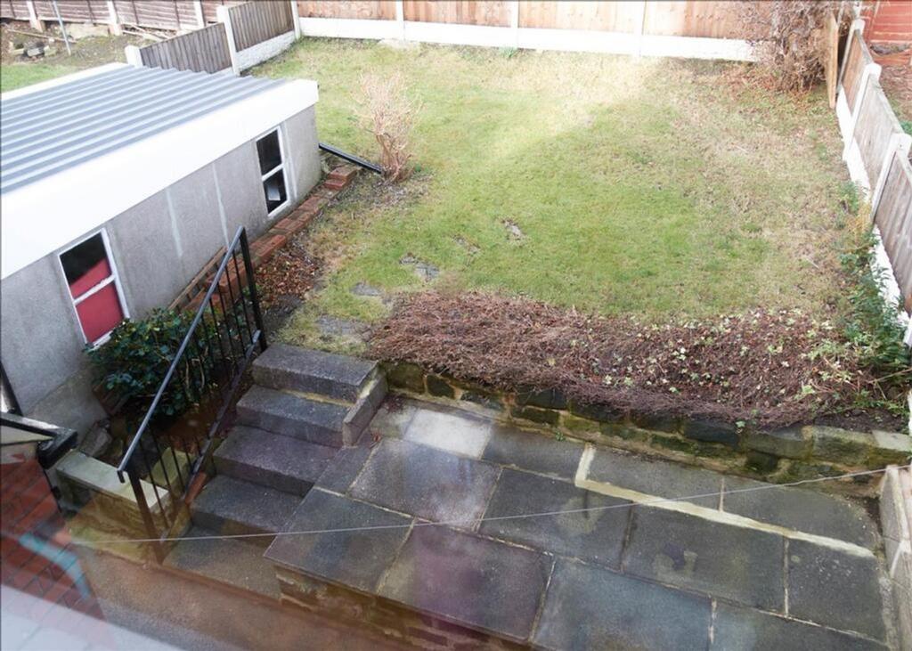 A charming garden space featuring well-maintain...