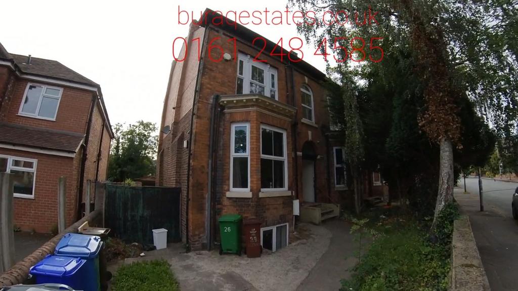 A charming detached brick house at the end of a...