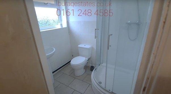 A clean and well-maintained bathroom featuring ...