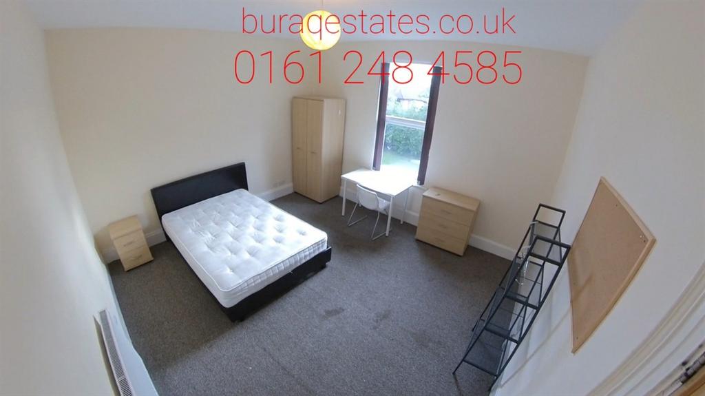 A neatly presented double bedroom featuring a c...