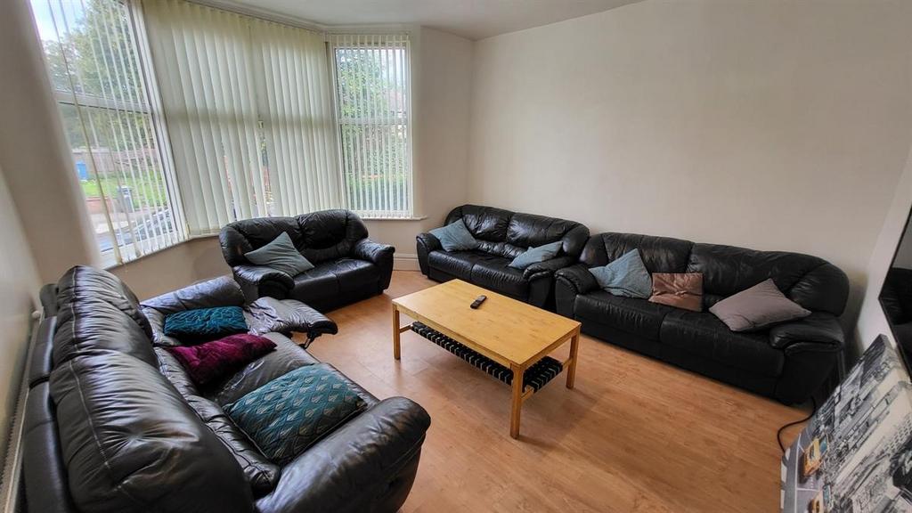 A comfortable and inviting living room featurin...
