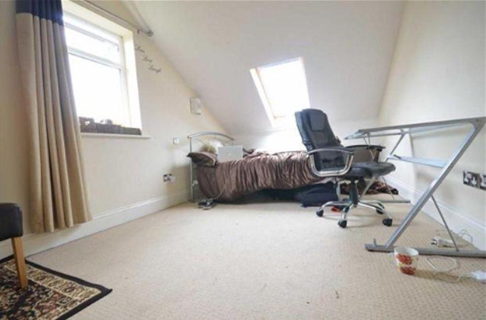 Bright and airy master bedroom featuring a doub...