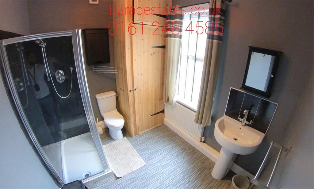 Bright and modern bathroom suite featuring a sp...