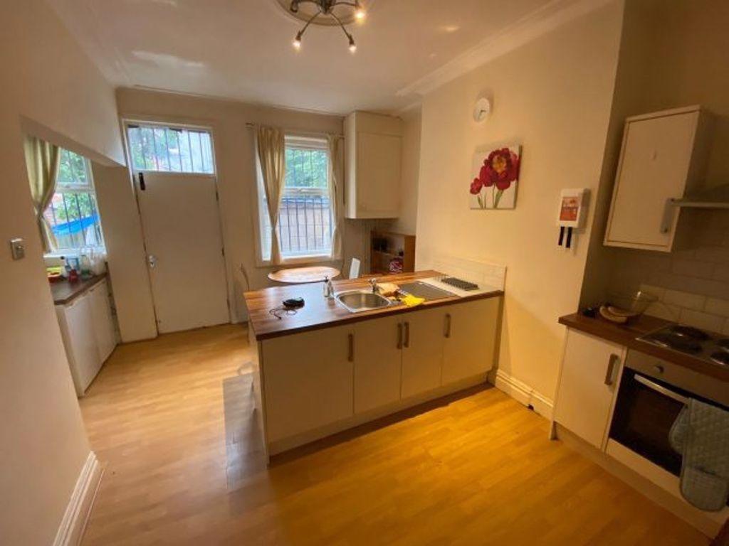 A bright and well-maintained kitchen featuring ...
