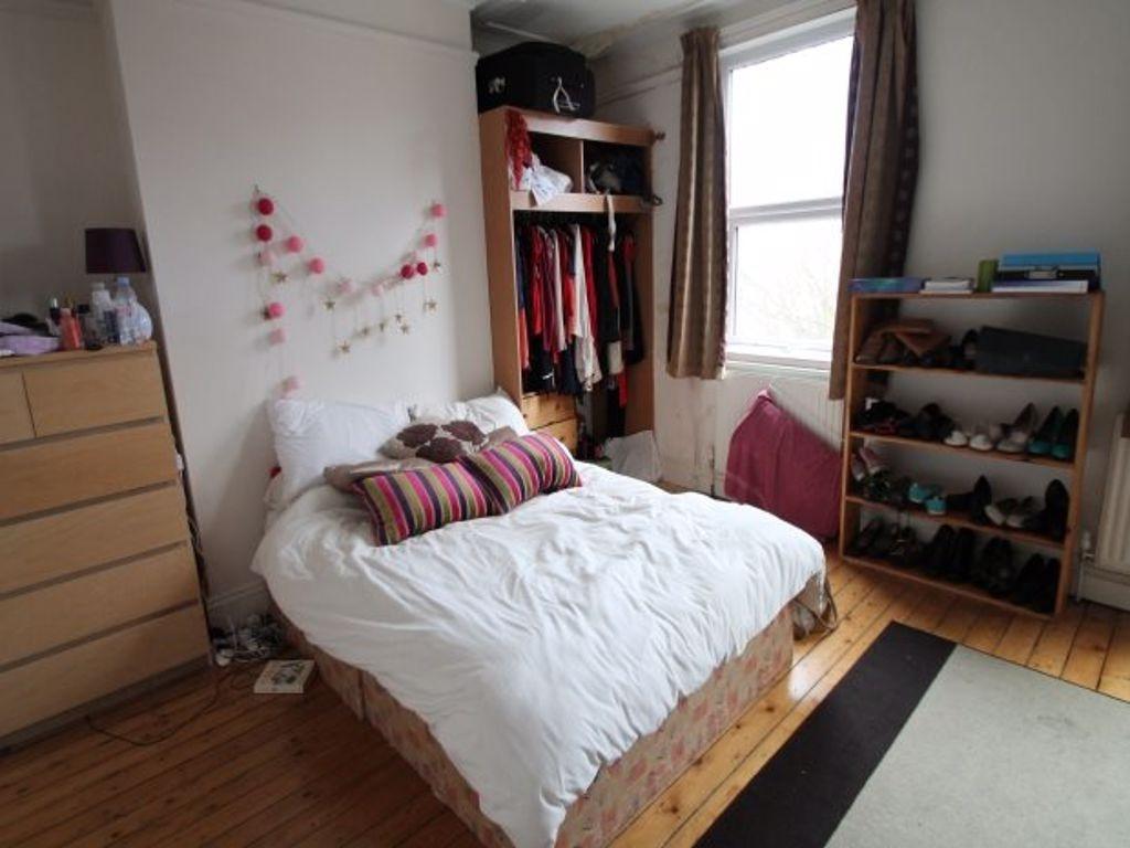 Cozy double bedroom featuring a comfortable dou...