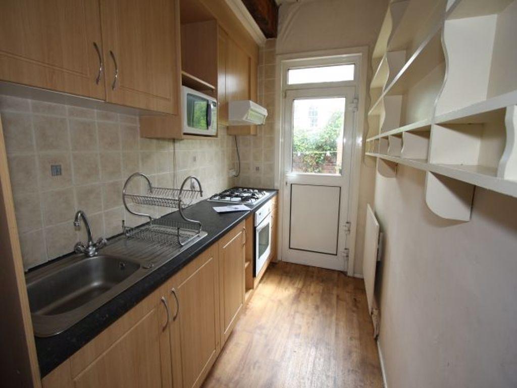 Bright and functional kitchen with ample storag...