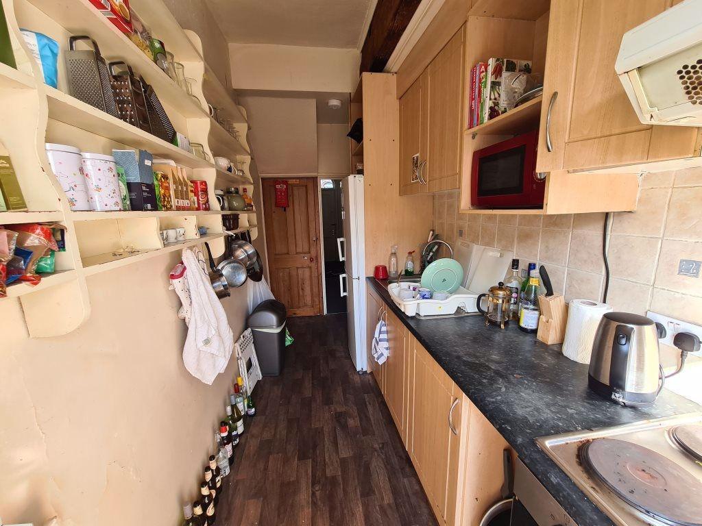 A well-equipped kitchen with a clean, modern co...