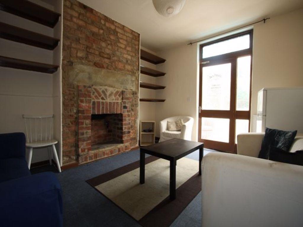 Bright and welcoming living room featuring larg...