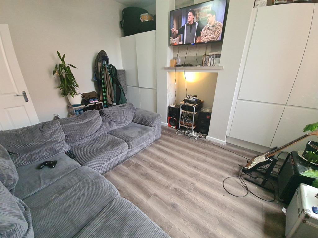Cozy and modern living room featuring a comfort...