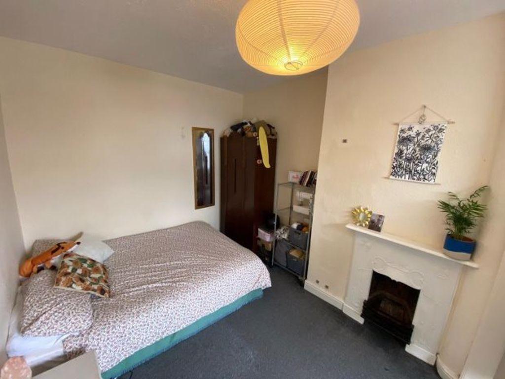 Bright and cozy double bedroom featuring a comf...