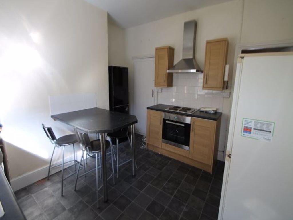 A modern, well-maintained kitchen area with amp...