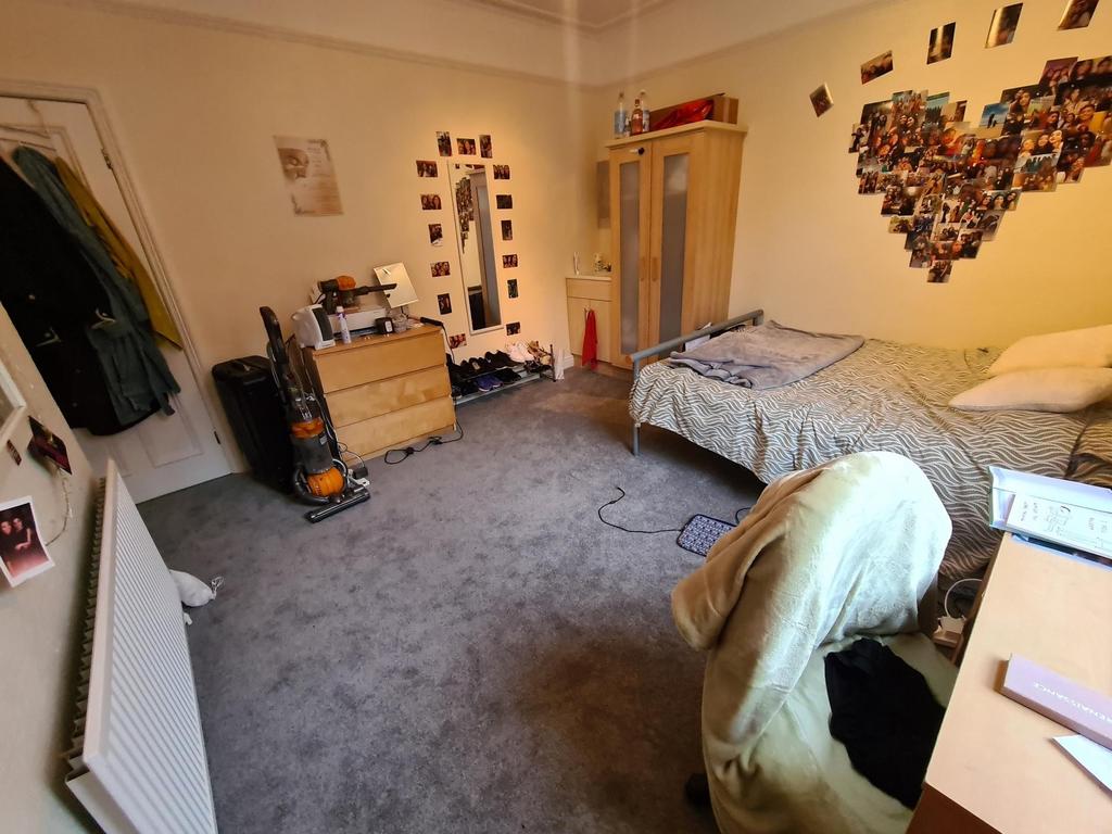 Bright, cozy double bedroom with a dressing are...