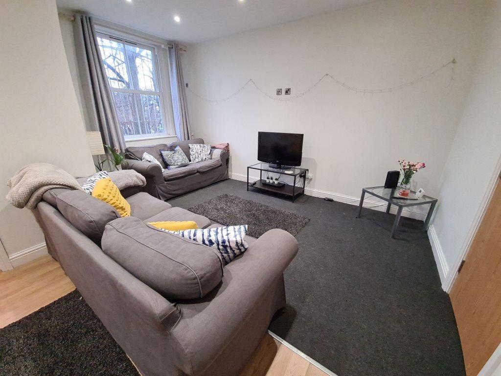 A bright and inviting contemporary living room ...