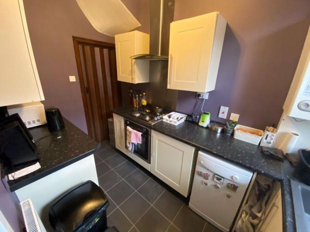 A modern and well-equipped kitchen featuring a ...