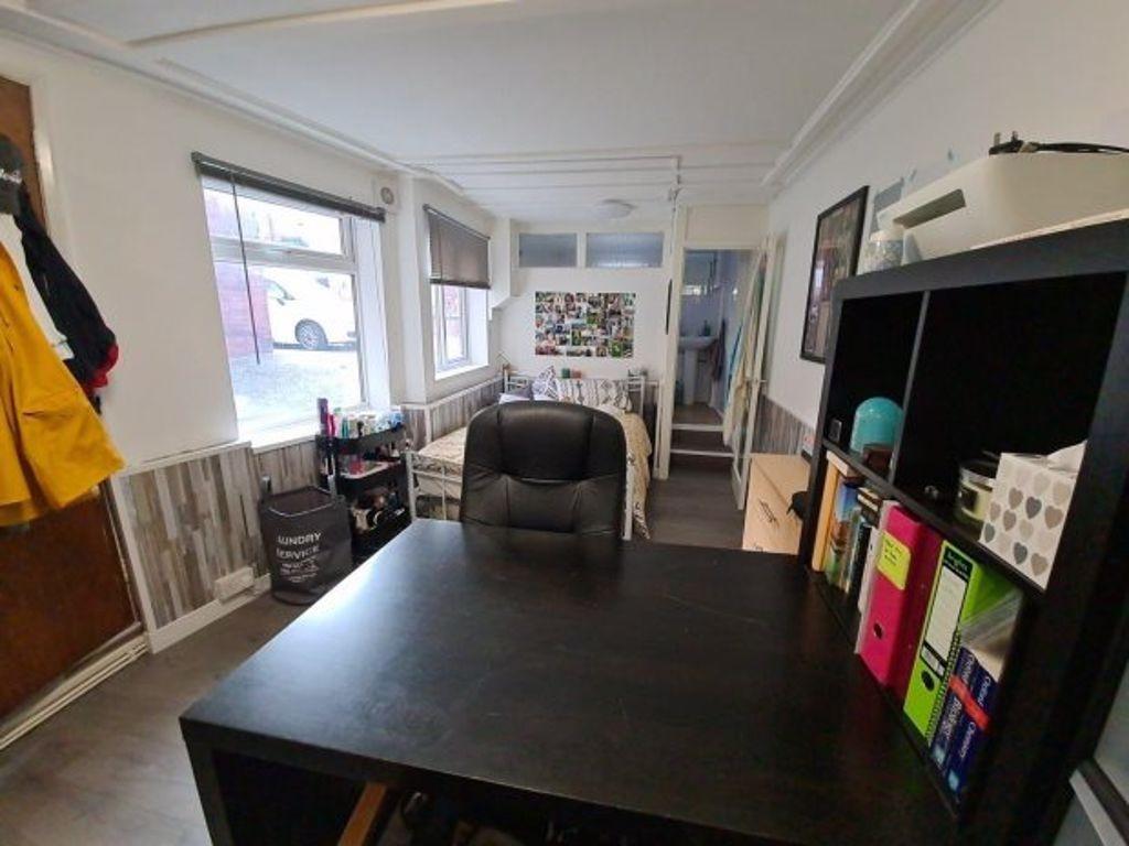 Bright and organized communal workspace featuri...