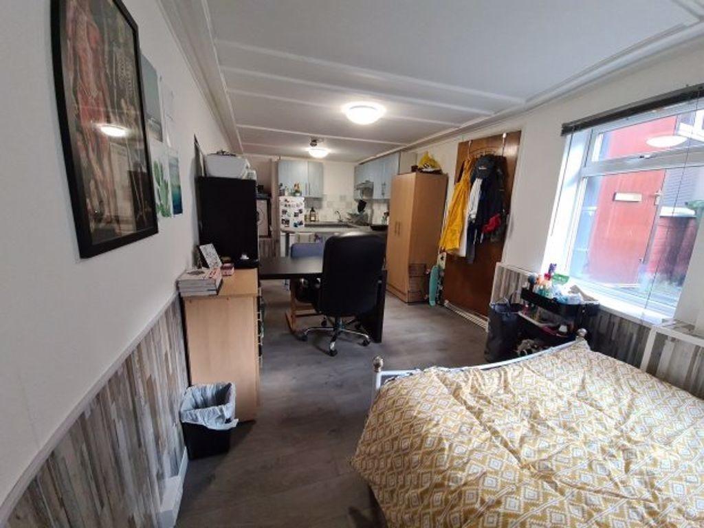 A clean and well-maintained single toilet room ...