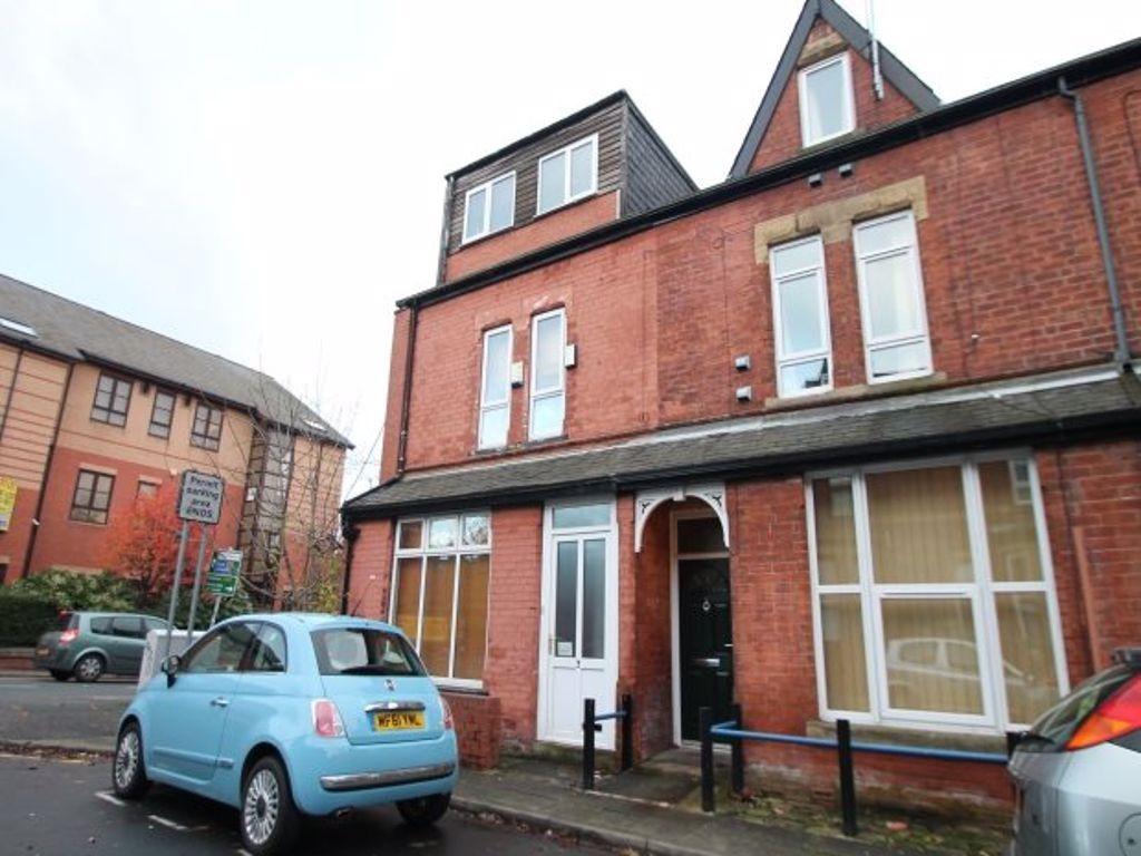 A charming red-brick terraced house featuring c...