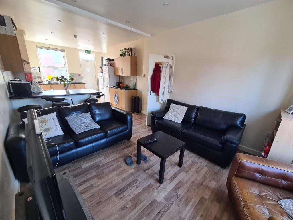 A cozy and inviting living room featuring two b...