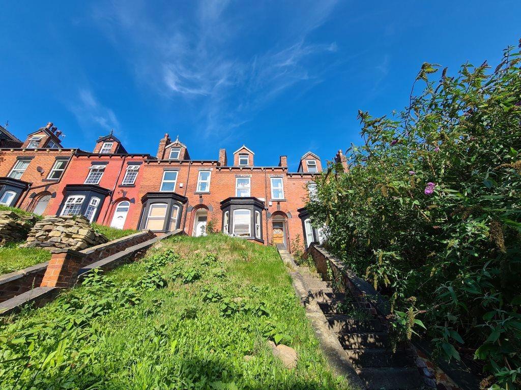 A charming row of classic terraced houses viewe...