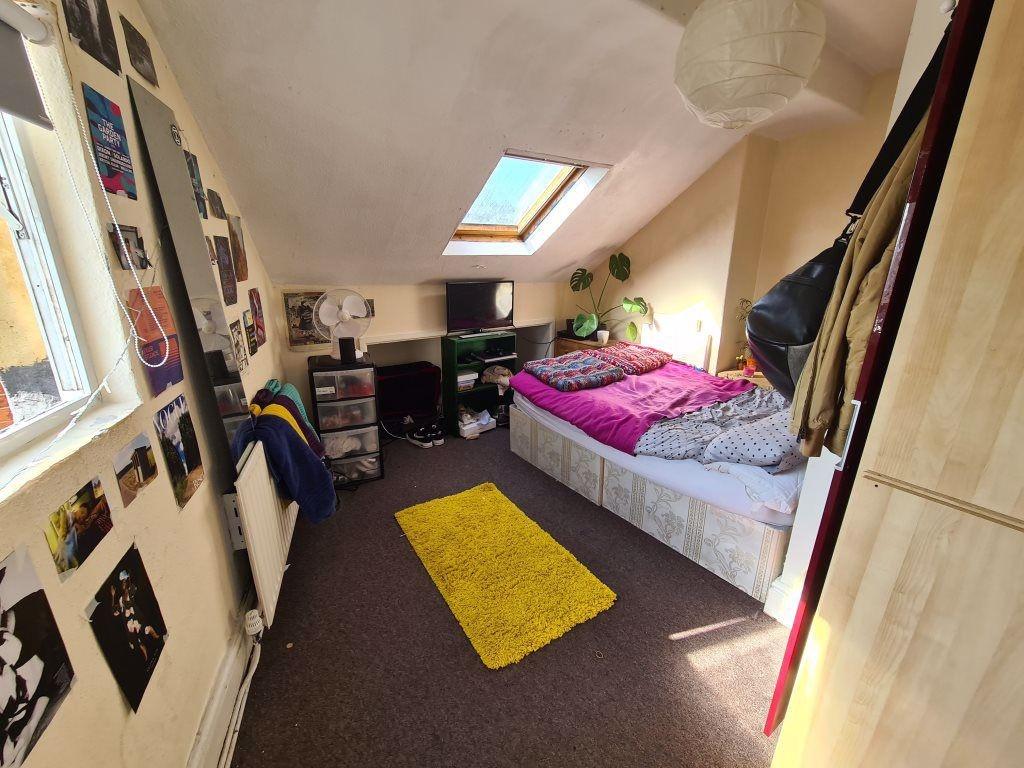 Bright and cozy double bedroom featuring a comf...