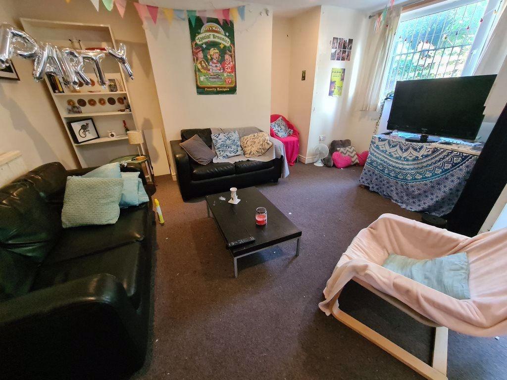 Cozy and inviting living room with comfortable ...