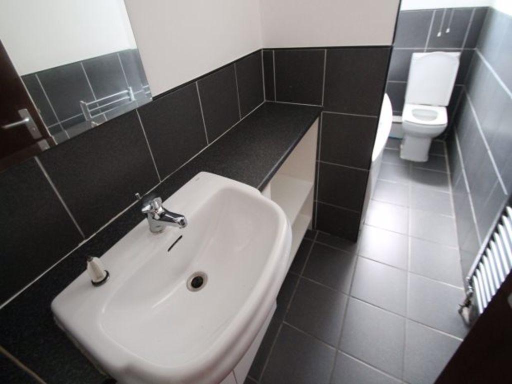 A modern and well-maintained bathroom featuring...