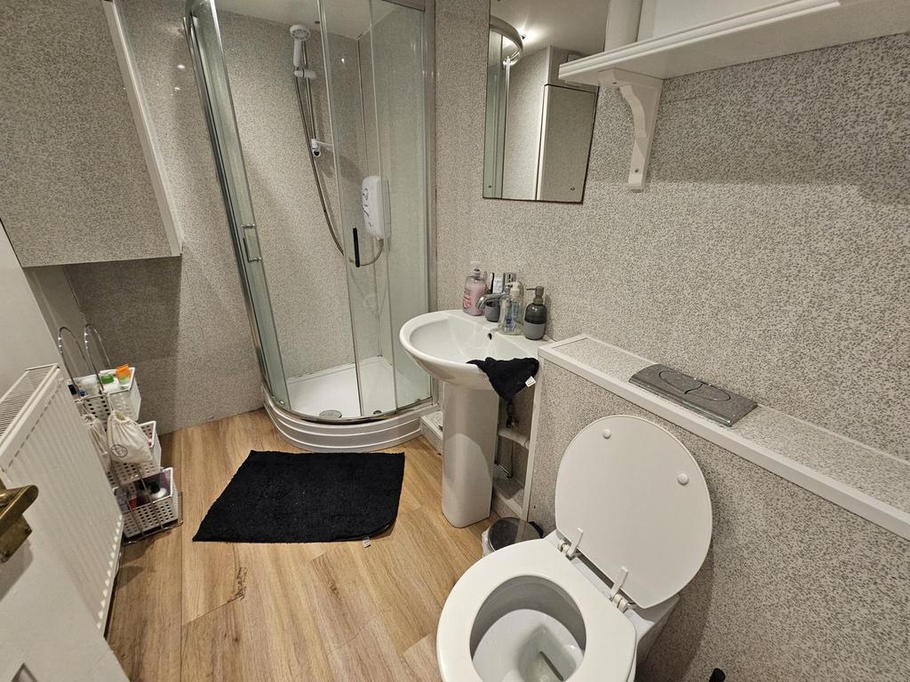 A modern and well-maintained bathroom featuring...