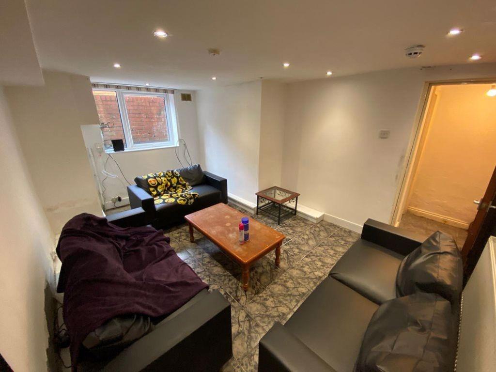 Bright and cozy living room featuring comfortab...