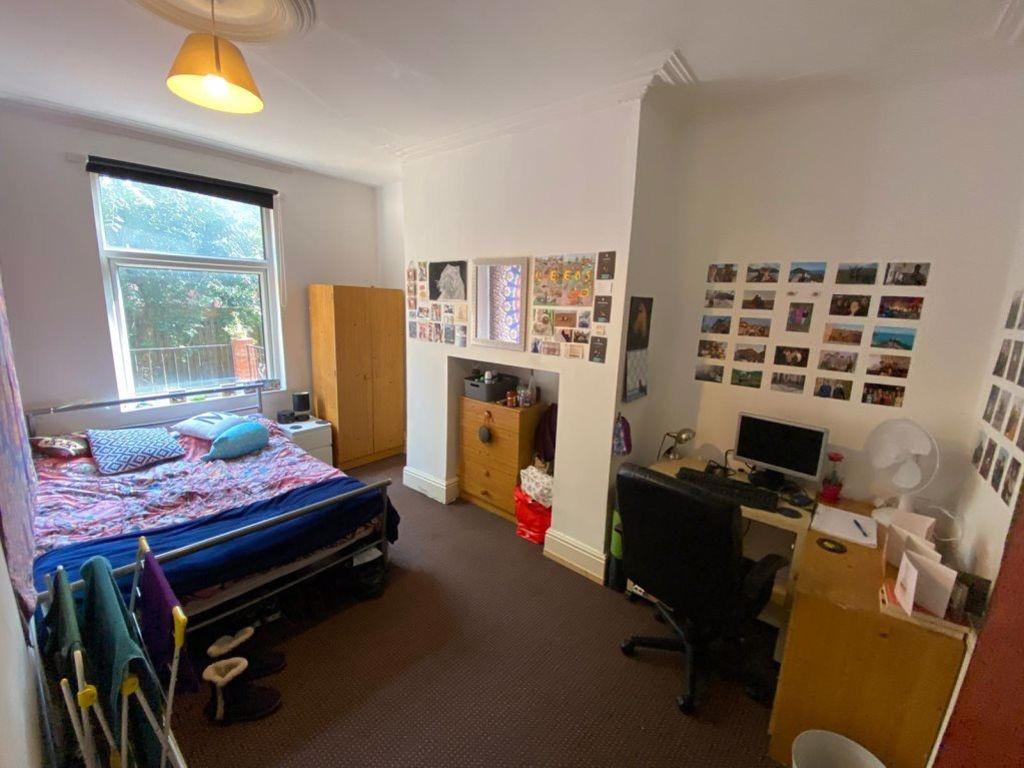 Bright and inviting double bedroom featuring a ...