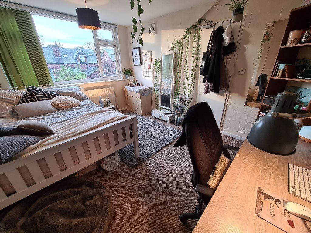 Bright and inviting master bedroom featuring a ...