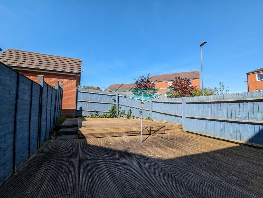 Bright and spacious garden area with wooden dec...