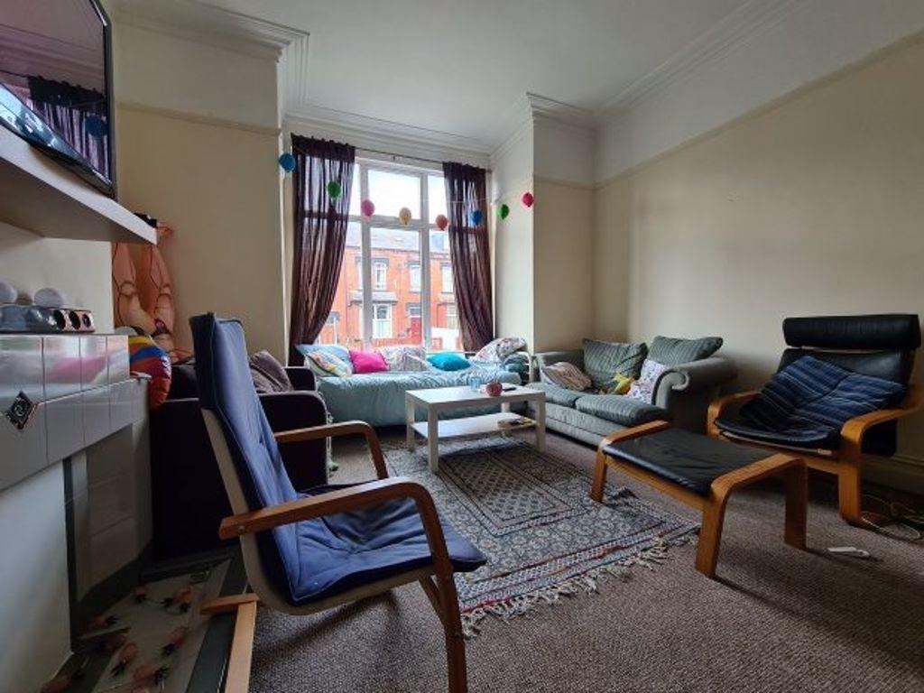 A cozy and inviting living room featuring comfo...