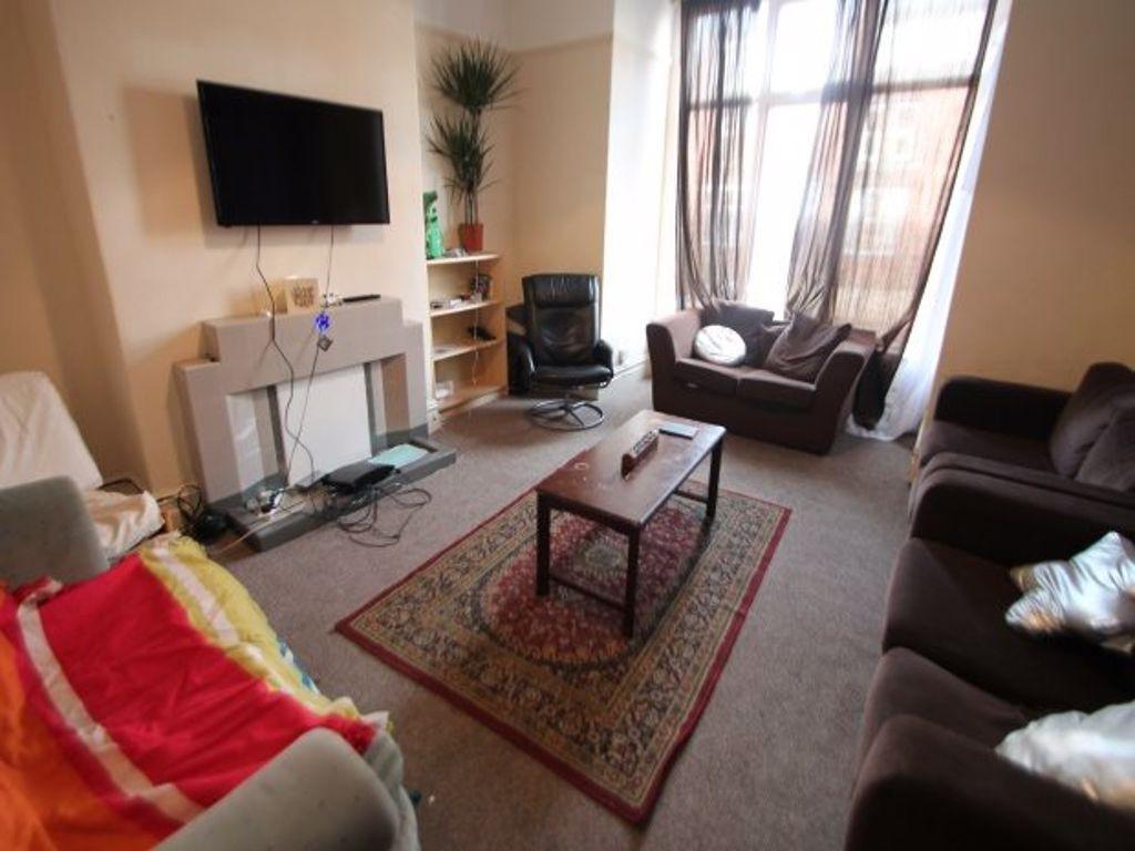 A cozy living room featuring comfortable seatin...