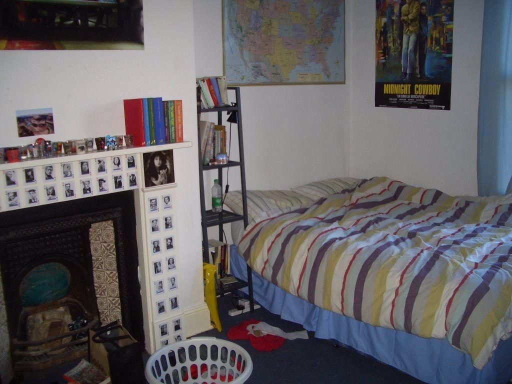 Cozy and welcoming bedroom featuring a comforta...