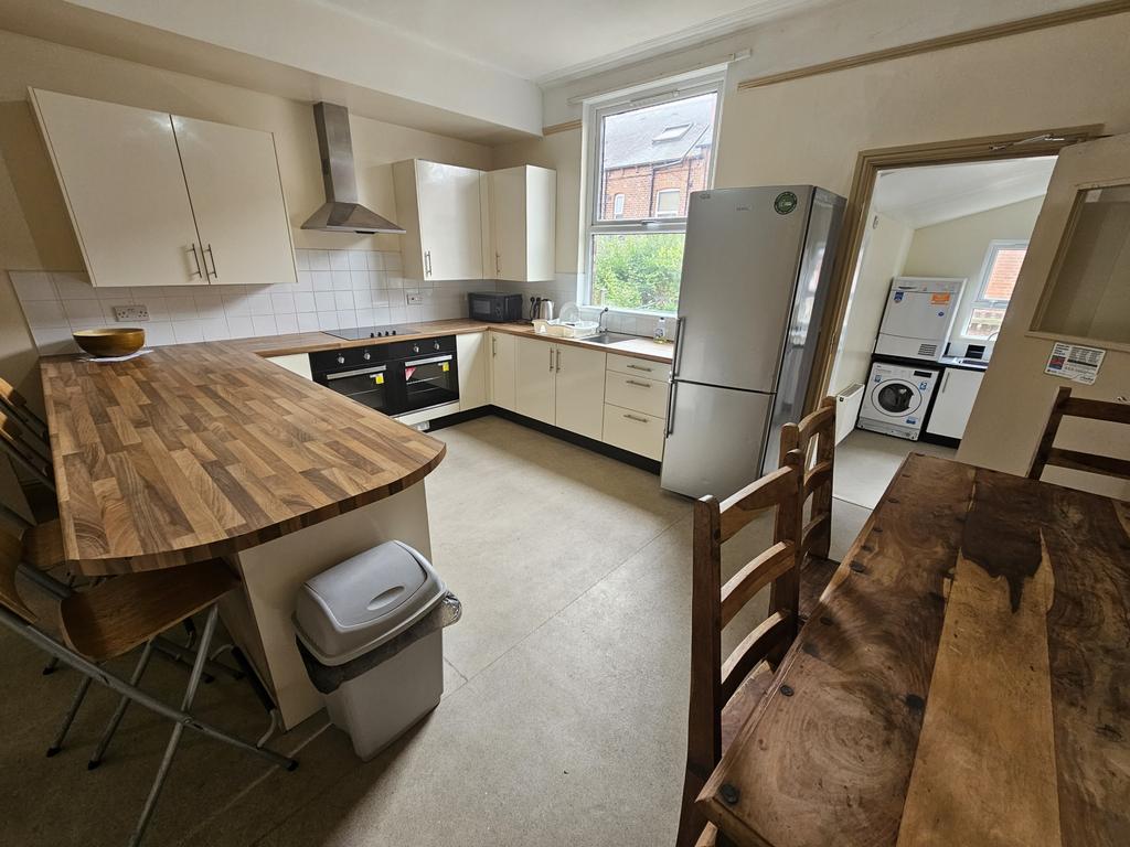 Bright and well-maintained kitchen featuring mo...