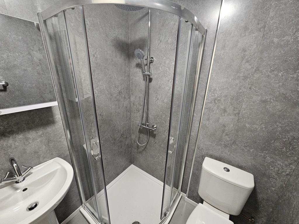 Modern and well-maintained bathroom featuring a...