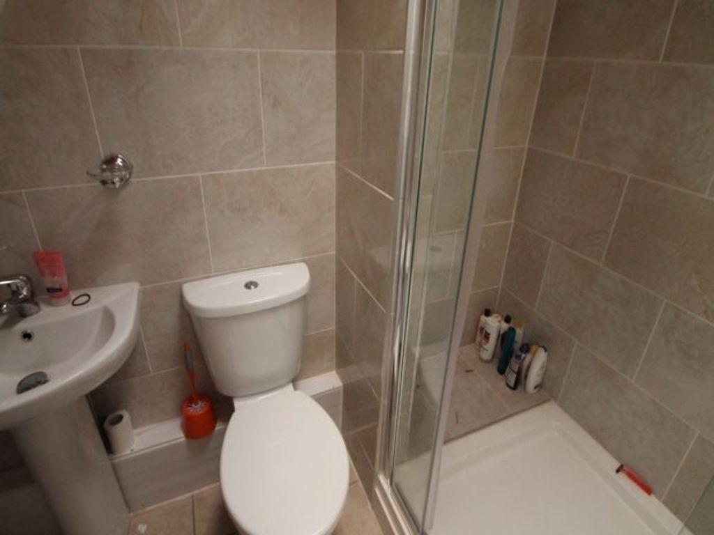 A clean and well-maintained bathroom featuring ...