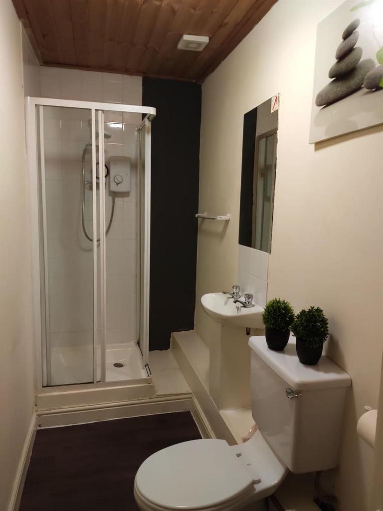 A neat and well-maintained bathroom featuring a...