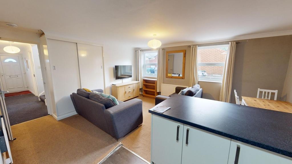 A spacious and inviting large modern living roo...
