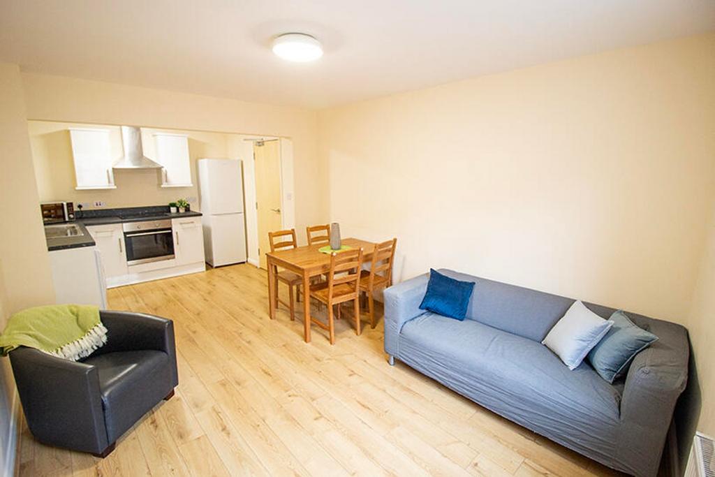 Bright and spacious living room featuring a com...
