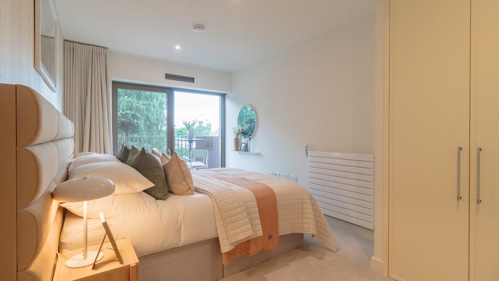 Main bedroom with balcony and built in wardrobe
