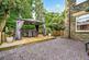 Rear garden and decked area over beck