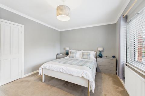 14 Raeburn Road, Northampton, NN2 7EU
