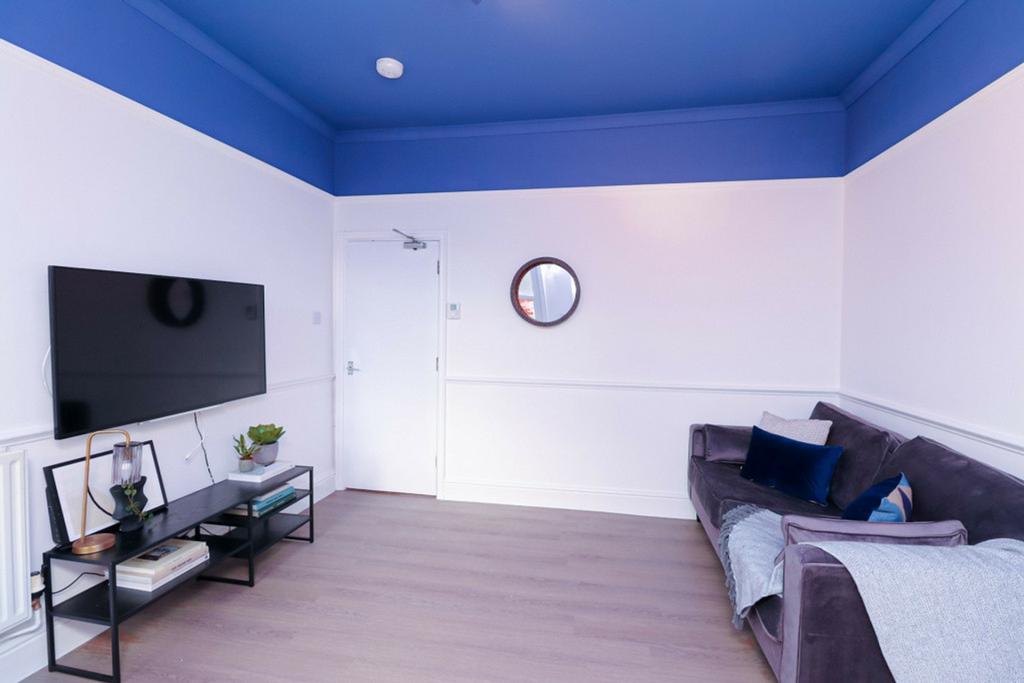 A spacious and inviting modern living room with...
