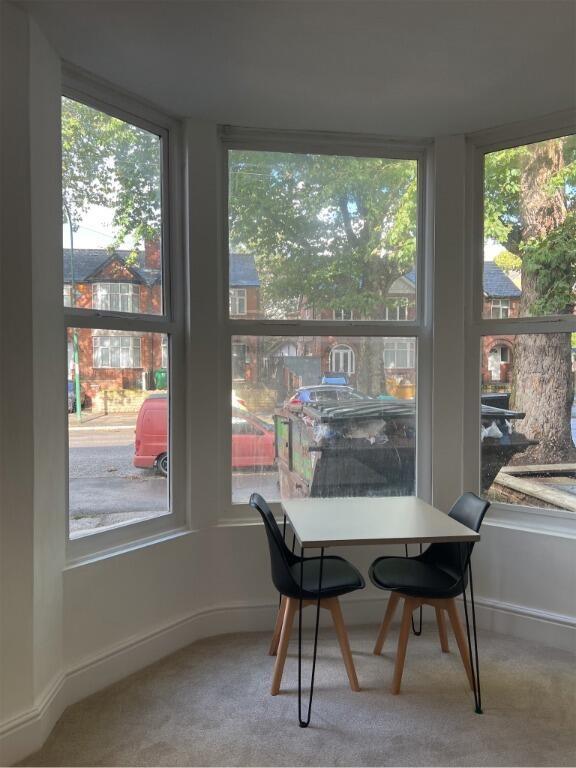 Bright and inviting living space with a large b...