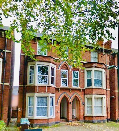 Charming front view of a classic terraced house...