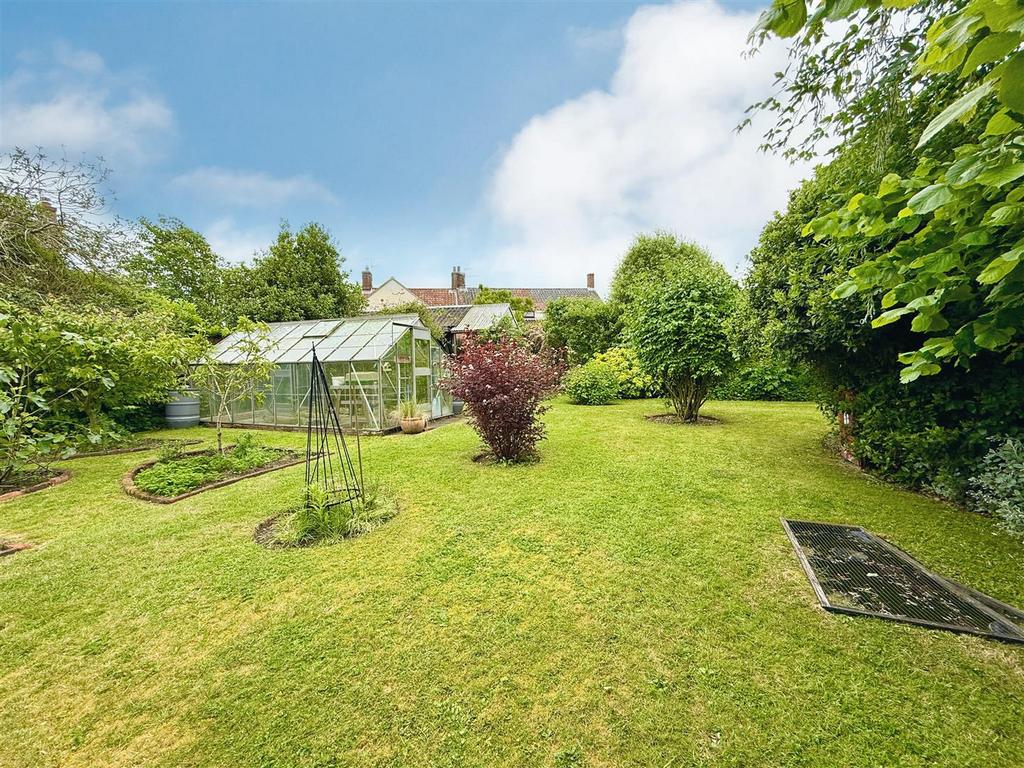 Garden with greenhouse