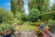 Mature trees &amp; flowerbeds