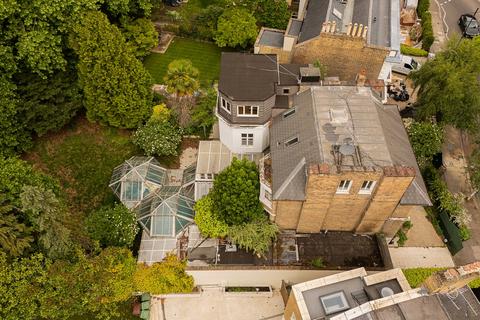 61 Addison Road, London, W14 8JJ
